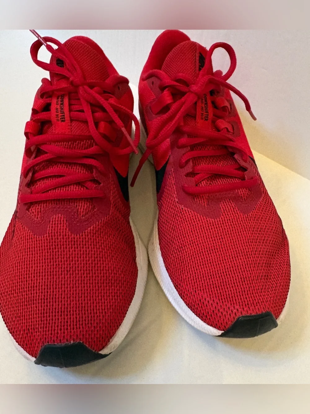 Nike Men’s Red Athletic Running Shoes with Black Swoosh